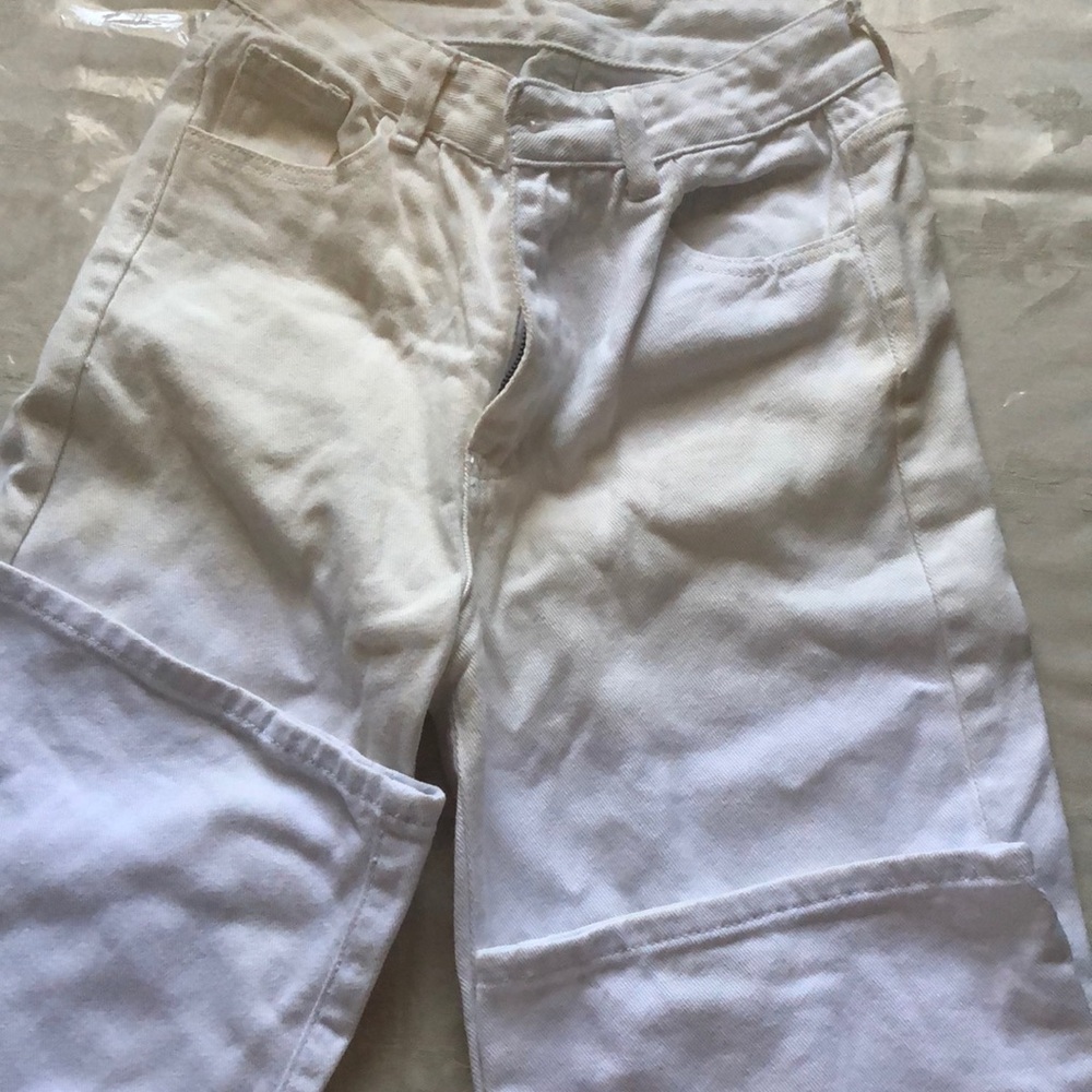 2 jeans , one is in mint condition